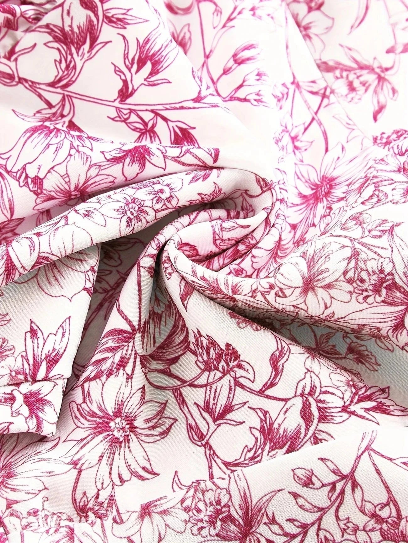 Ortagus | Minivestido floral con tirantes y volantes