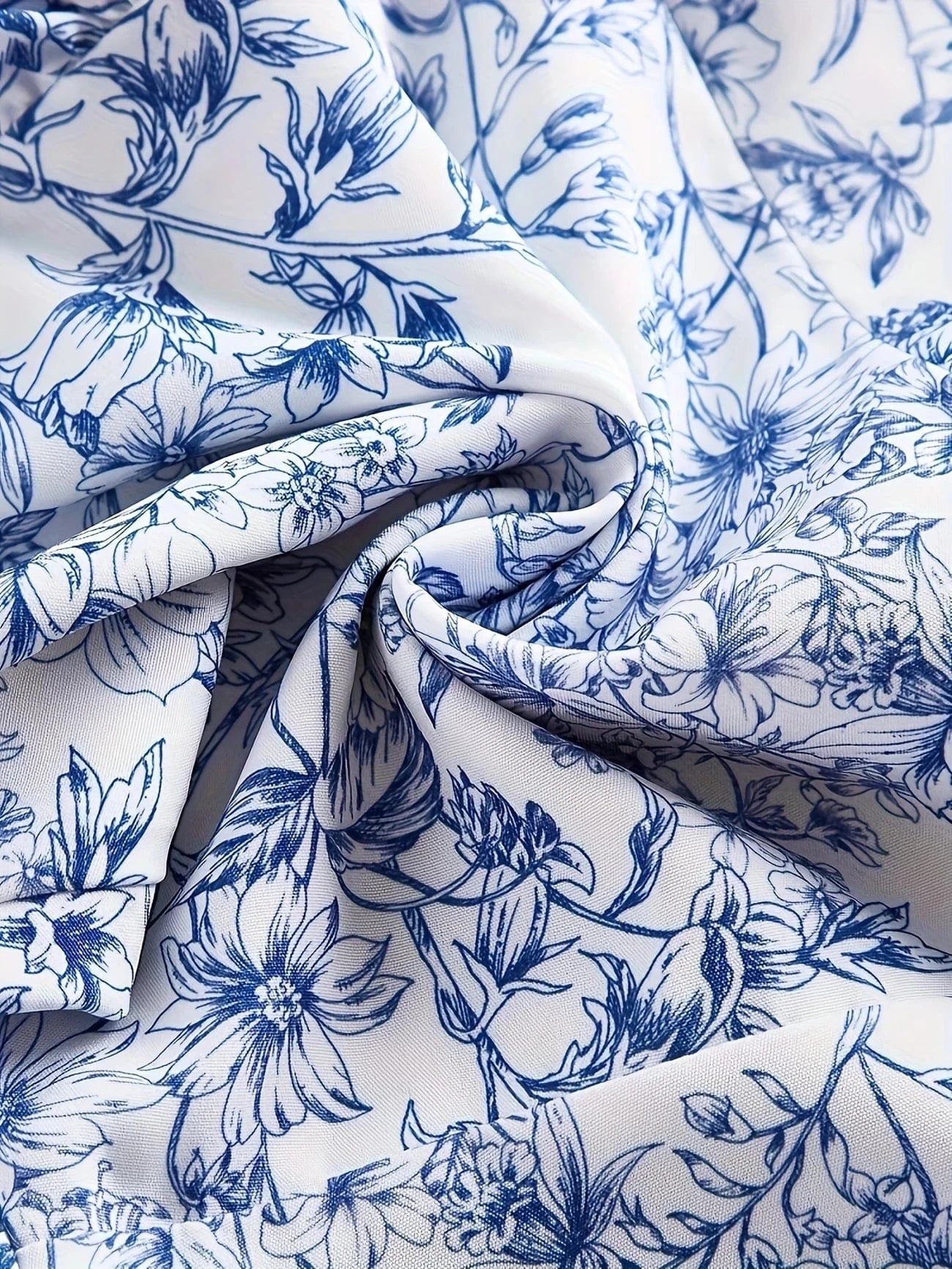 Ortagus | Minivestido floral con tirantes y volantes