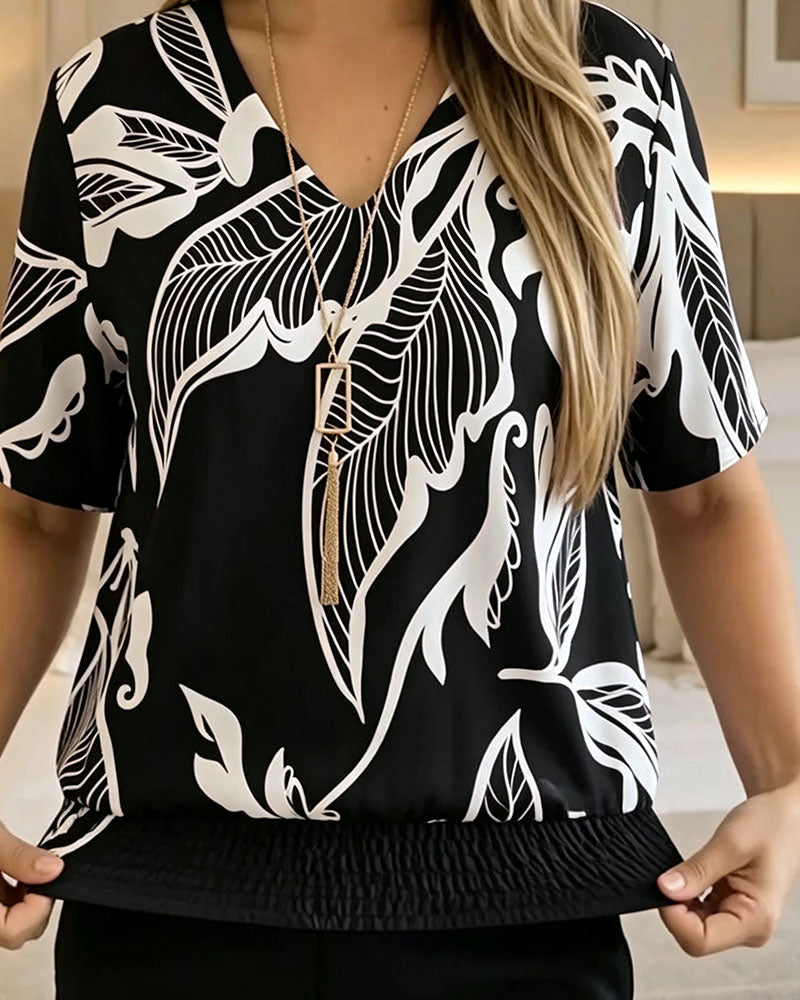 Isheba | Blusa Con Estampado de Hojas y Bajo Fruncido