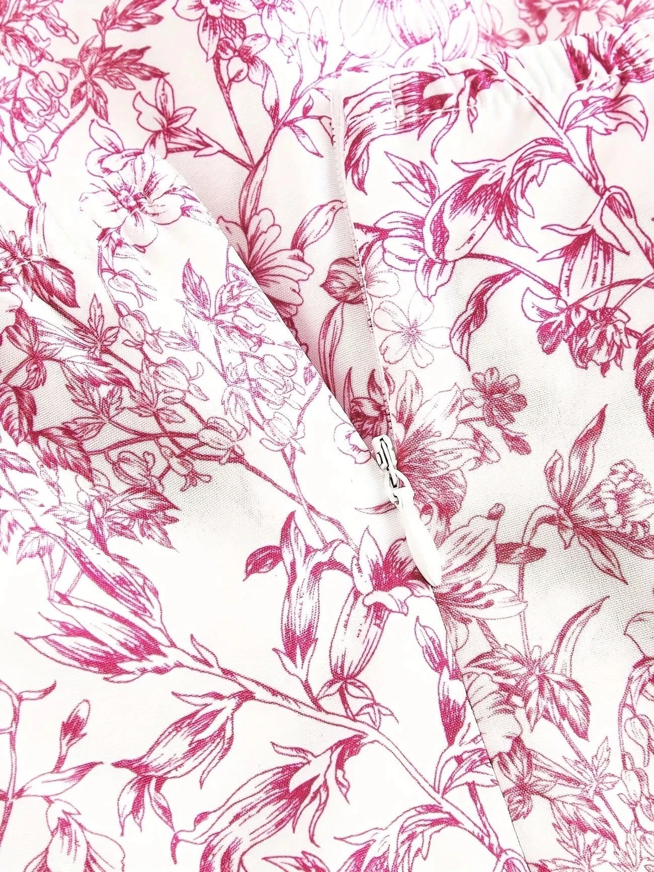 Ortagus | Minivestido floral con tirantes y volantes