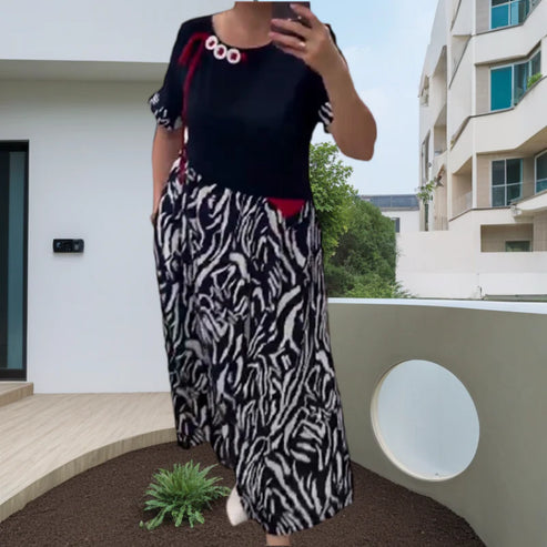 Zahara - Vestido Midi de Manga Corta Con Estampado de Cebra en Patchwork